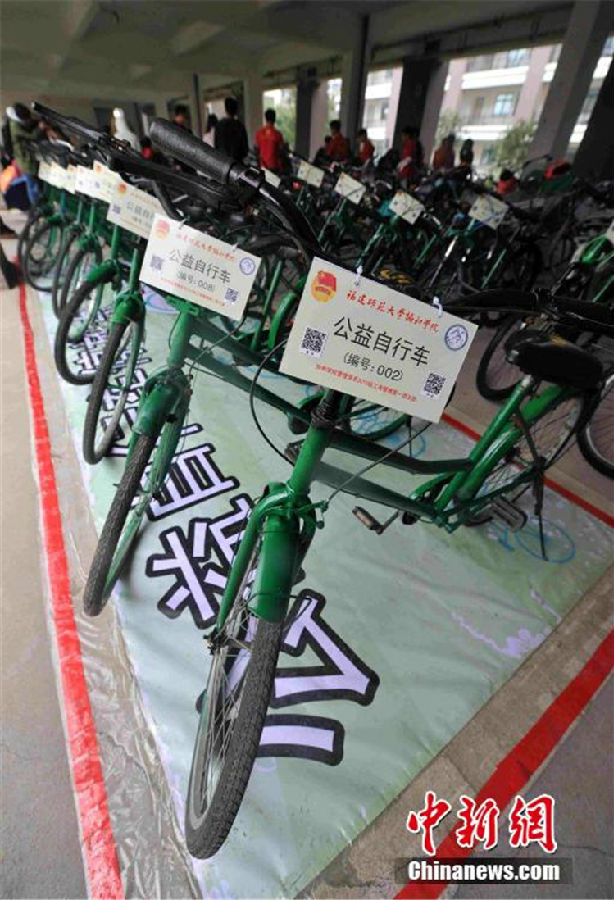 校园内由“僵尸自行车”变身公益自行车在校园公益自行车站点供师生们免费使用.jpg